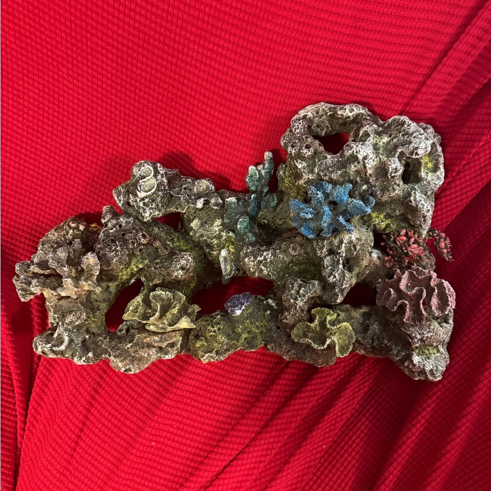 synthetic aquarium decor designed to look like a coral reef